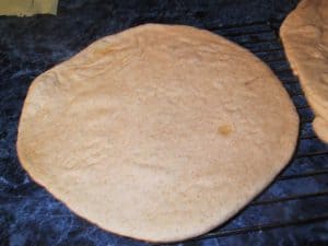 A par-baked pizza shell ready for topping