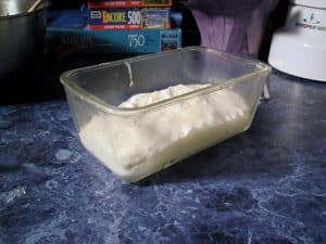 Dough poured into a bread pan