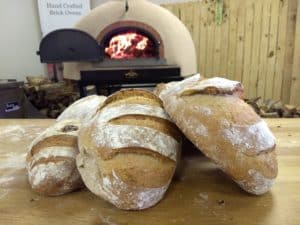Breads From The Wood Fired Oven In the Background
