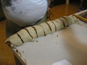 And then each quarter into three more segments.  Hint – use a sharp knife or sewing thread!