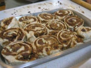 Cover the rolls with cling wrap and let them until they are doubled in size.  This is often overnight.  If they aren't doubled, bake them anyway – there will be great oven spring and the rolls will be just fine.