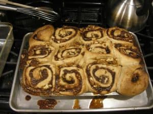 Make sure you put the pan with the rolls onto a baking sheet pan– the sugar will bubble over! The rolls are baked, nice and brown.