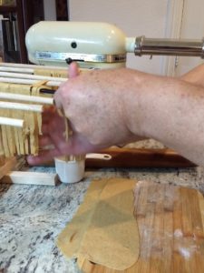 pasta 16 Putting fettuccine on a drying rack